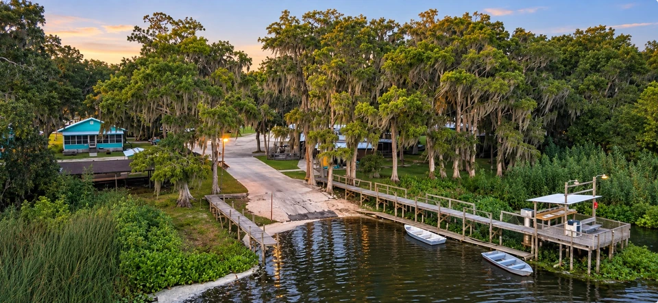 An aerial view of the harbor boat ramp, docks and boats on Lake Lochloosa
